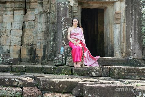 Cambodian Girl At The Entrance To Bayon Temple In Angkor Thom C