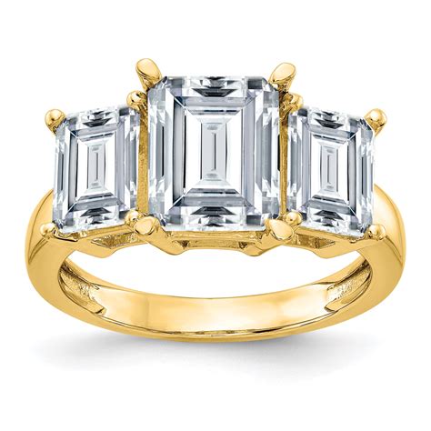 saris    yellow gold emerald cut  stone engagement ring