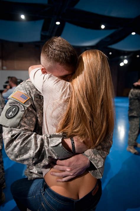 a us army soldier from charlie company 1st battalion of the 3rd soldier homecoming kissing