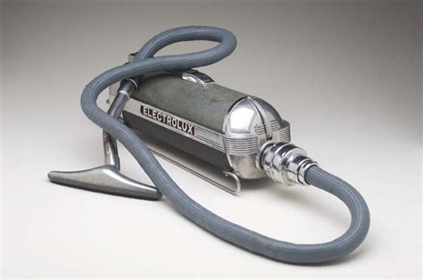 electrolux model xxx vacuum cleaner and 5 attachments by lurelle guild 1937 industrial design