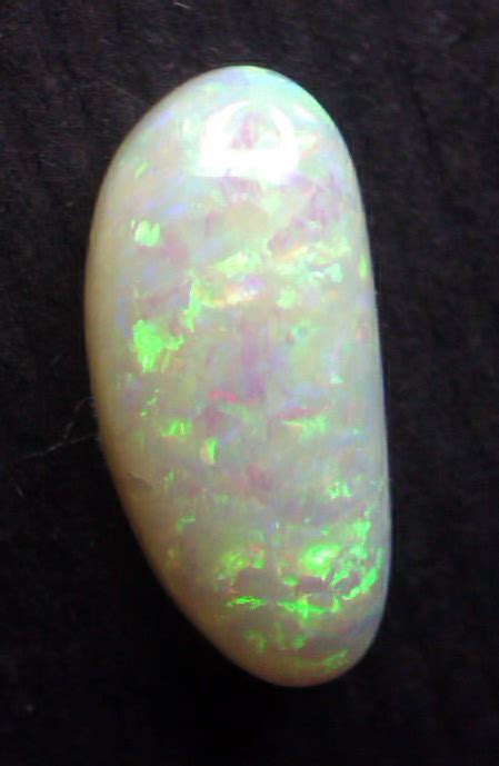witte opaal met multi color vuur veel groen vuur  catawiki