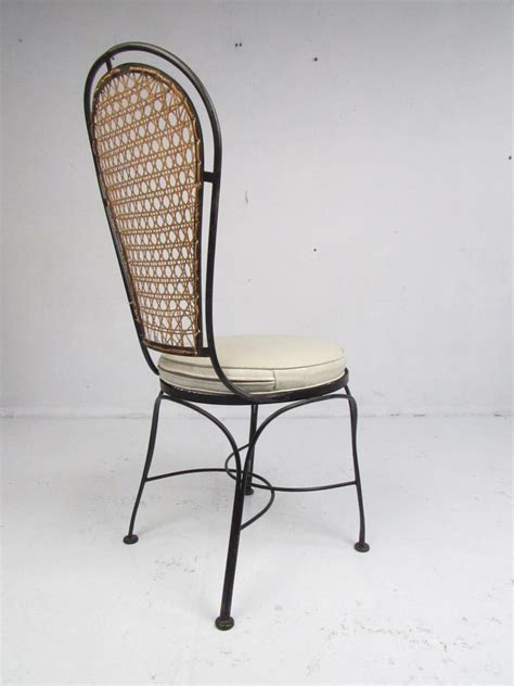 set   midcentury wrought iron dining chairs   cane backrest