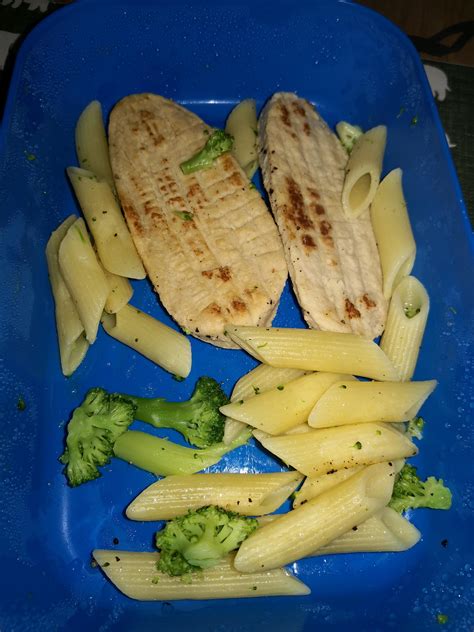 i present you my wife s quornfillet with unseasoned pasta and broccoli served in a plastic