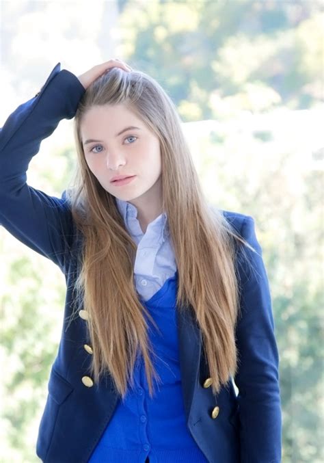 enticing schoolgirl with sexy long hair alice march flaunts her