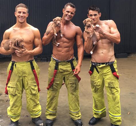 smokin hot firemen are posing with pups but it s for charity so it s