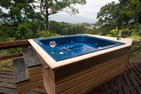 incorporating  hot tub   small  luxurious space love chic living