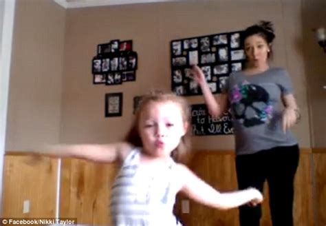 pregnant mother and her six year old daughter show off their best moves in dynamic dance routine