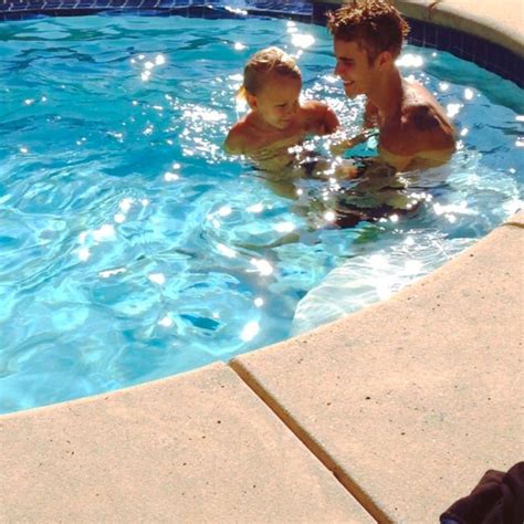 Watch Justin Bieber Go For A Sweet Swim With His Little Bro E Online