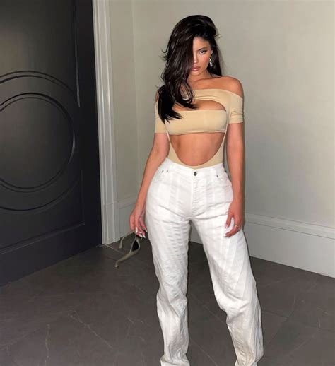 kylie jenner matches outfits  people cars   surroundings