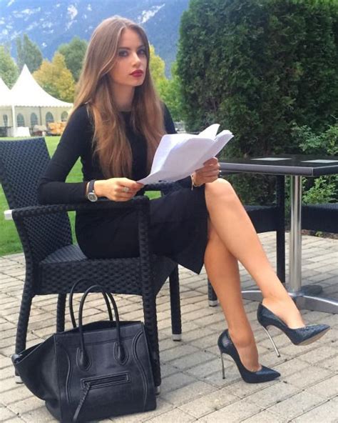Business Sexy In A Little Black Dress And Great Legs