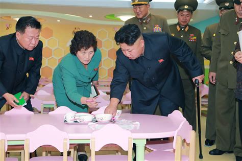 Kim Jong Un Closely Inspects Hello Kitty Set At Orphanage