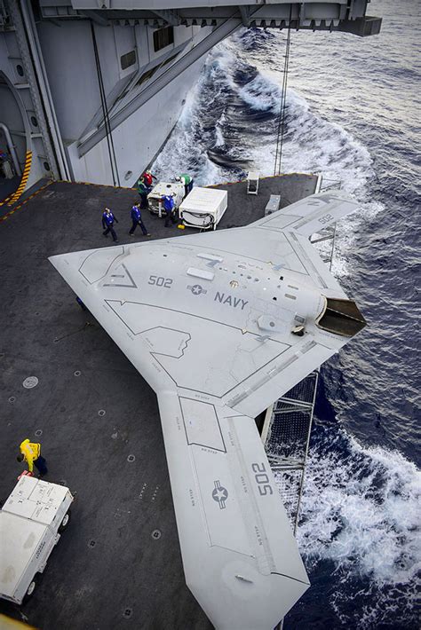 navys     drone designed      aircraft carrier heres   close