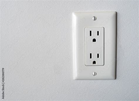 isolated north american power outlet plug  socket   white wall
