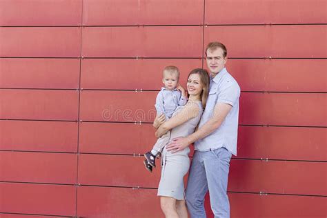 portrait   young family   red background stock image image  recreation freedom
