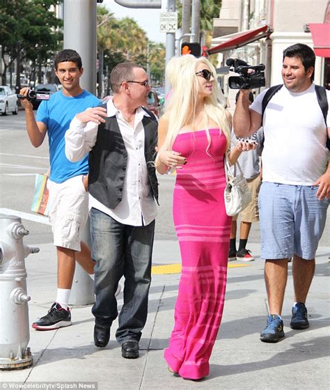 courtney stodden s pink maxi dress barely covers her new dd implants at lunch with husband doug
