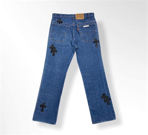 chrome hearts leather cross patch mid wash vintage denim jeans   luxury shopper