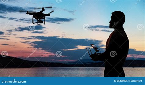 man flying  drone stock photo image  sundown propeller