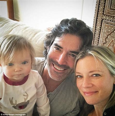 amy smart defends accused husband carter oosterhouse daily mail
