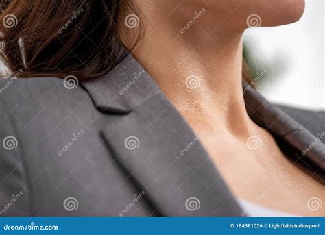 view  young woman suffering  heat  sweat  neck  white
