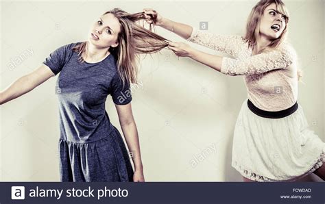 Aggressive Mad Women Fighting Each Other Pulling Hair Two