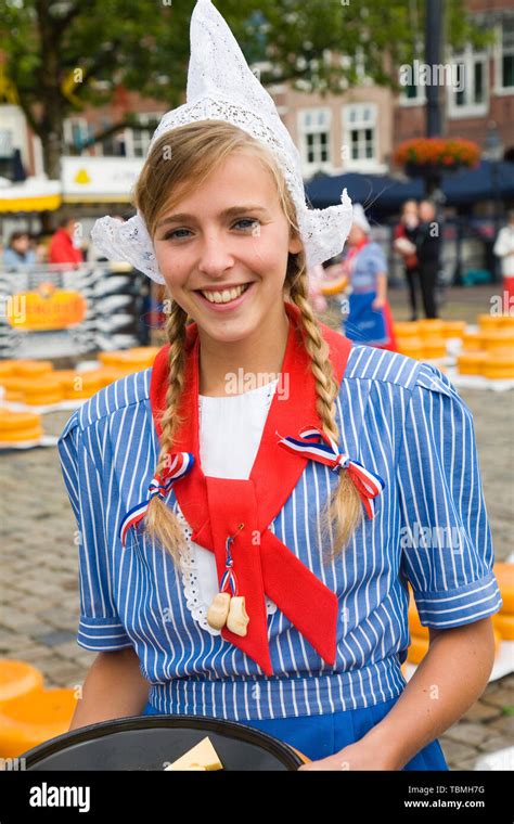pretty smiling girl  traditional dutch costume gouda cheese market south holland