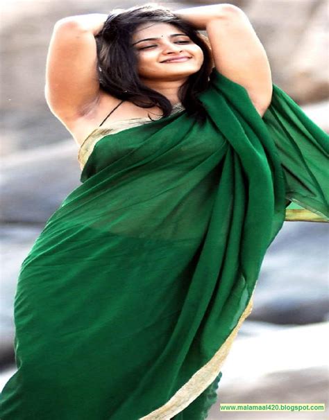 sexy bollywood s actress and mallu s anushka shetty in green saree no blouse hot images and biography