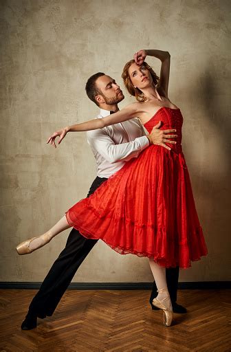 Female Ballet Dancer And Male Latin Dancer Mix The Styles Together