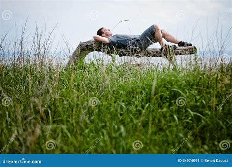 young adult relaxing peacefully  nature stock image image