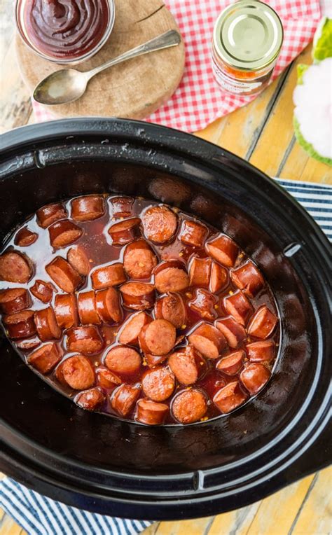 slow cooker sweet and spicy kielbasa bites the cookie