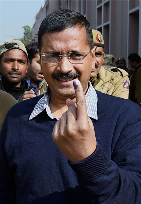 Delhi Votes Arvind Kejriwal Kiran Bedi At Polling Booths