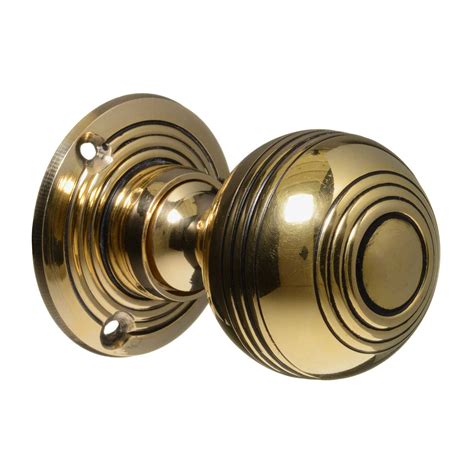 georgian door knobs brass reeded pair