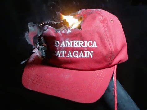 trump voters throw maga hats  twitter bonfire breitbart