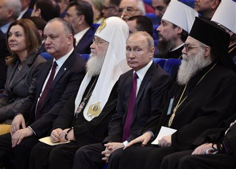 putin seeks to add russians faith in god to