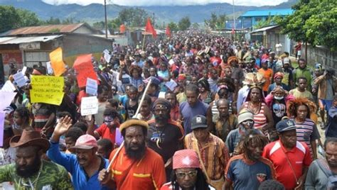 west papua more than 500 arrested marching for