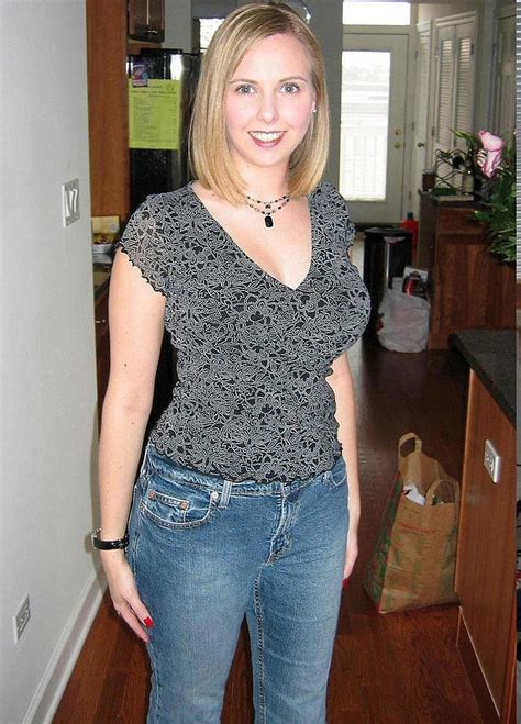 Married And Cheating Housewife Wearing Black Print Top And Blue Jeans