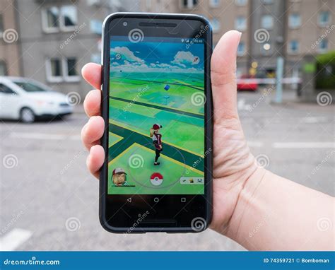 people playing pokemon go the hit augmented reality smart phone app