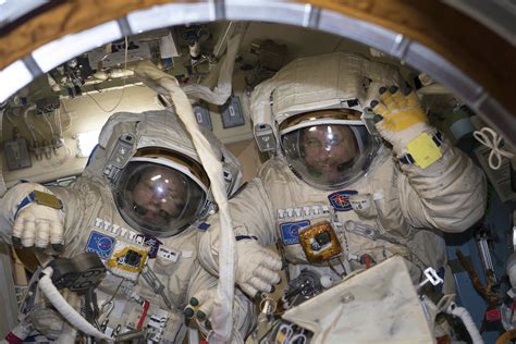cosmonauts throw out the rubbish as they upgrade international space