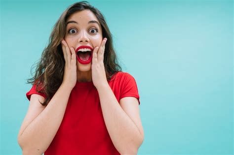 photo surprised  excited woman
