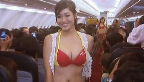 Sexy Flight Attendants Flout Safety To Flaunt Their Bodies