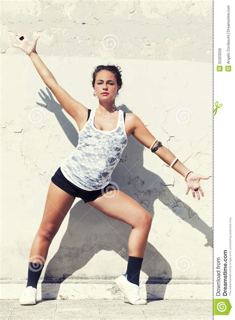 sensual brunette tanned girl wall behind arms and legs spread stock image image of glamor
