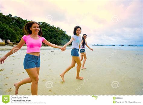 girls having fun at the beach stock images image 6900634