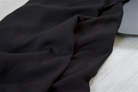 light flowy black fabric  designer stock small bobbins