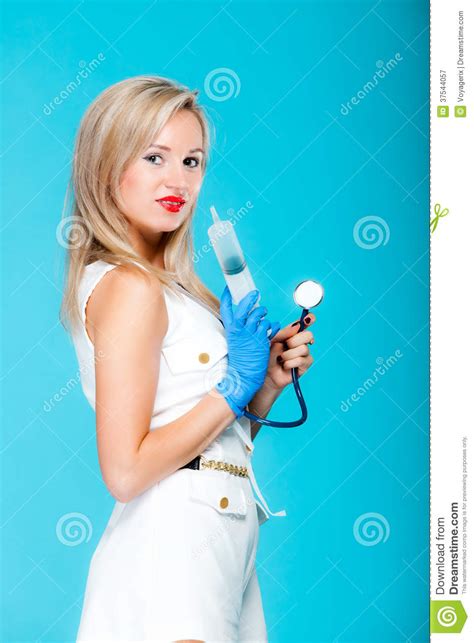 funny girl doctor nurse with syringe stethoscope stock