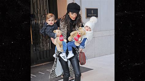 Amal Clooney Carries Her Adorably Dressed Twins Around Nyc