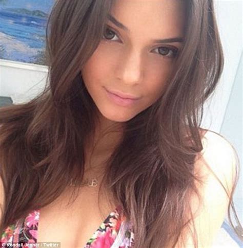 kendall jenner frolics on the beach as she models cute and
