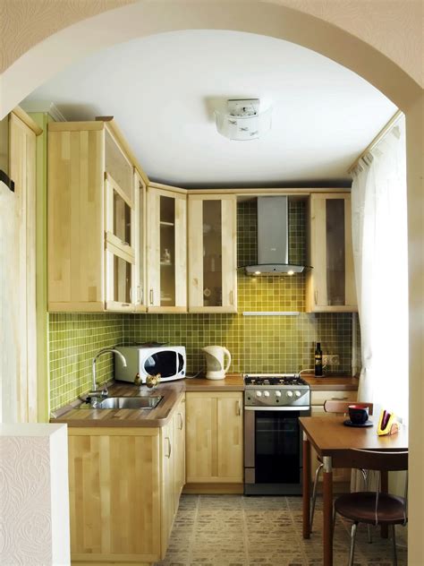 downsized appliances light wood cabinetry   large open window