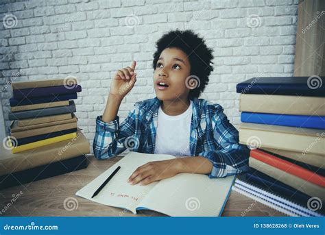african american  boy   homework stock photo image