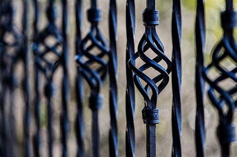 maintaining  homes wrought iron fence