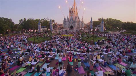 thousands  employees  yoga  disneys magic kingdom