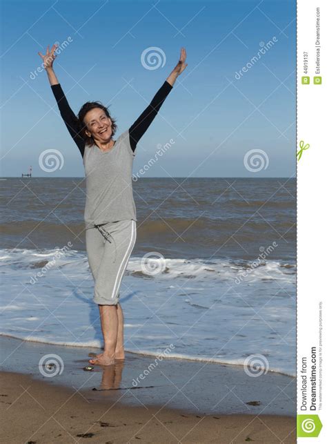 Happy Mature Woman Standing In The Sea Stock Image Image Of Female